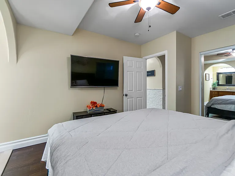 When you're ready to relax, stay entertained with our smart TV in the master.