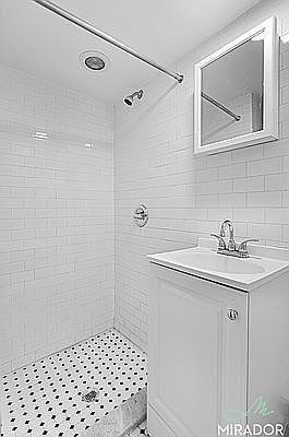 5th image of 332 E 9th St APT 14