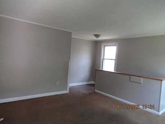 Living Room to kitchen and to downstairs