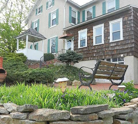 Side of house, brick patio