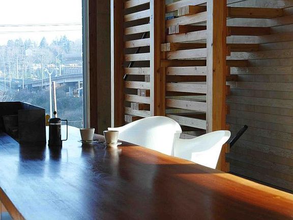 Standing in kitchen looking towards living room