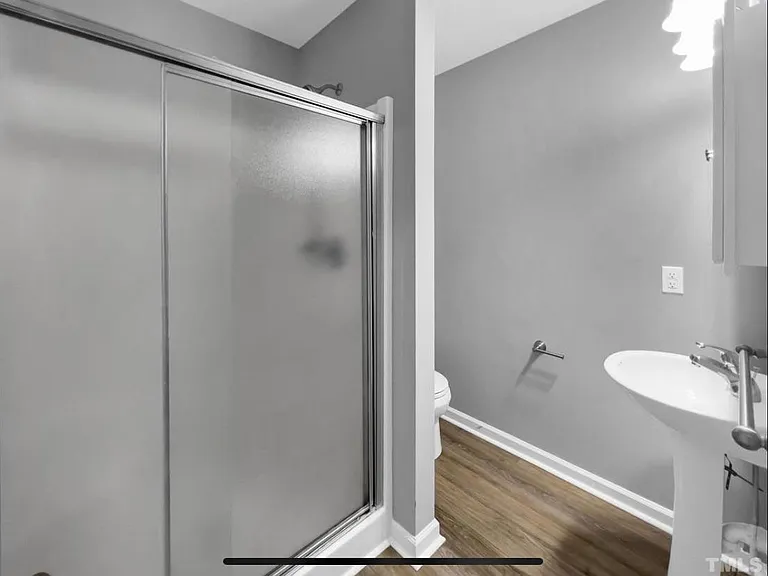 Shower with bench and sprayer combo