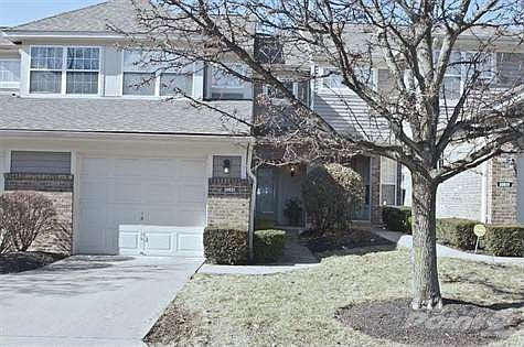 Spacious two-story town home overlooking beautiful Kentucky hills.  Large dining and living room. Entertainment at its best with finished lower level including wood fireplace and walkout.  Maintenance free living in the beautiful Triple Crown community!