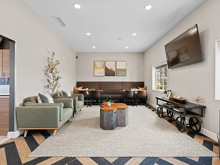 The clubhouse media room and cafe lounge is perfect for a change of scenery for those who work from home, or to unwind and recharge.