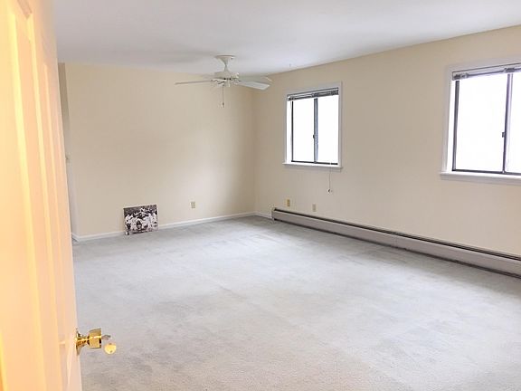 Large open sunny living/dining area
