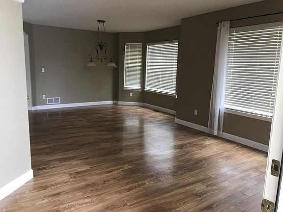 Living/Dining room with beautiful Laminate flooring