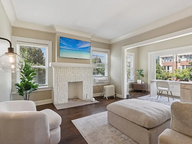 Living room with a fireplace.