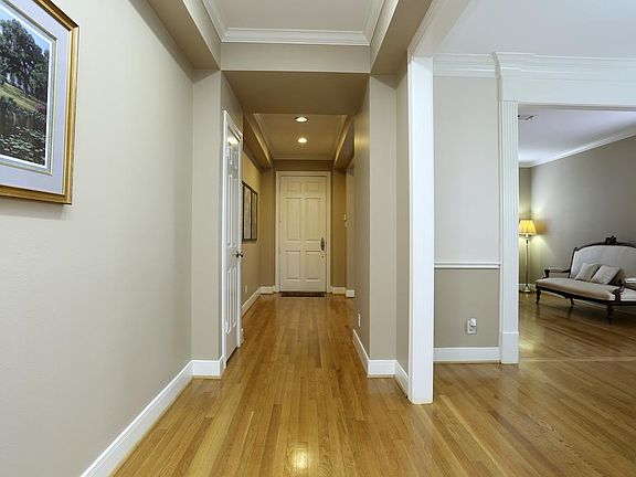 Wide entry with beautiful white oak hardwood floors(per seller). Fresh and easy neutral colors and c