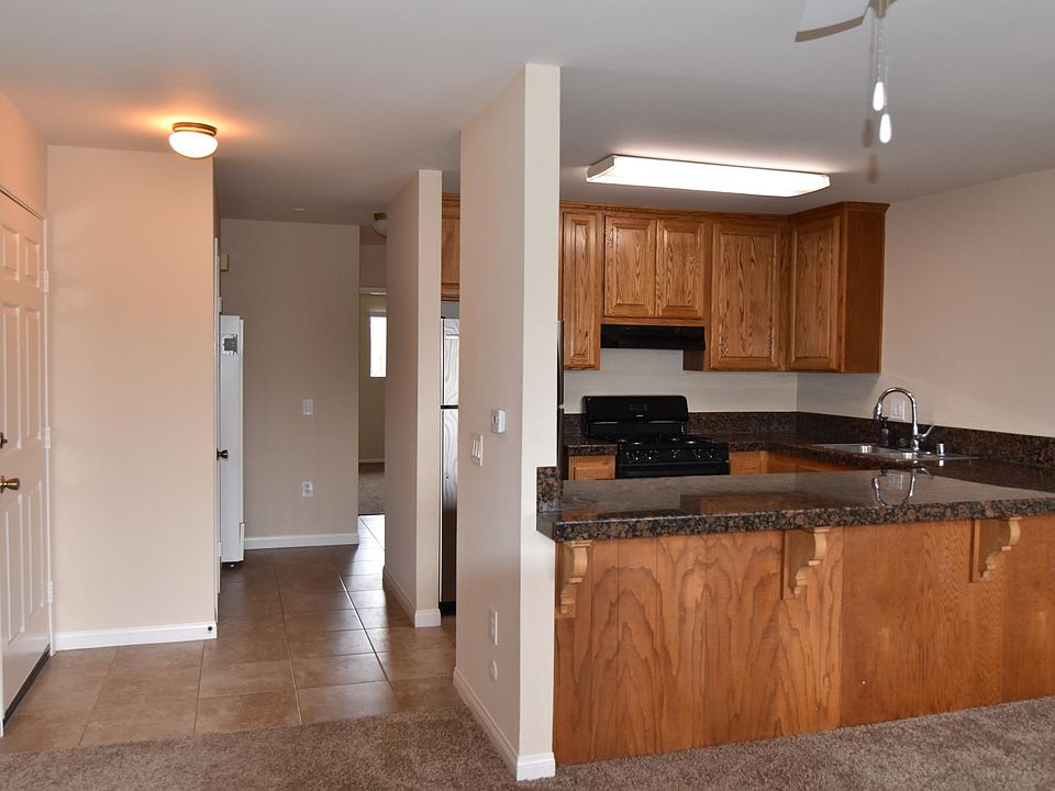 View from living room into hallway and kitchen