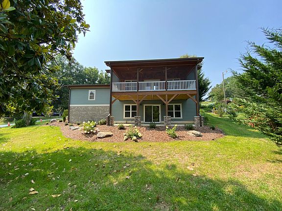 Back patio and screened in porch.