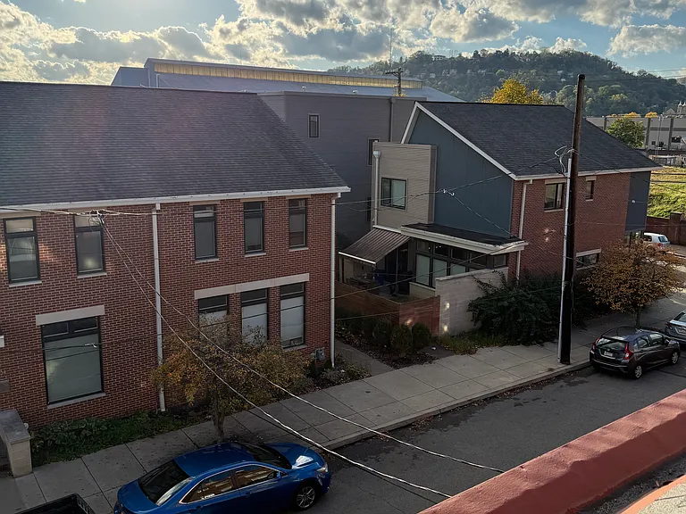3rd Floor glorious views of new brick housing directly across the street, as well as long views of Pittsburgh's rolling hills and urban, downtown area