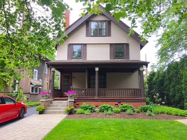 25 Calumet Street--street view. Private entrance and driveway (right). Private front porch--accessed through French doors in living room.