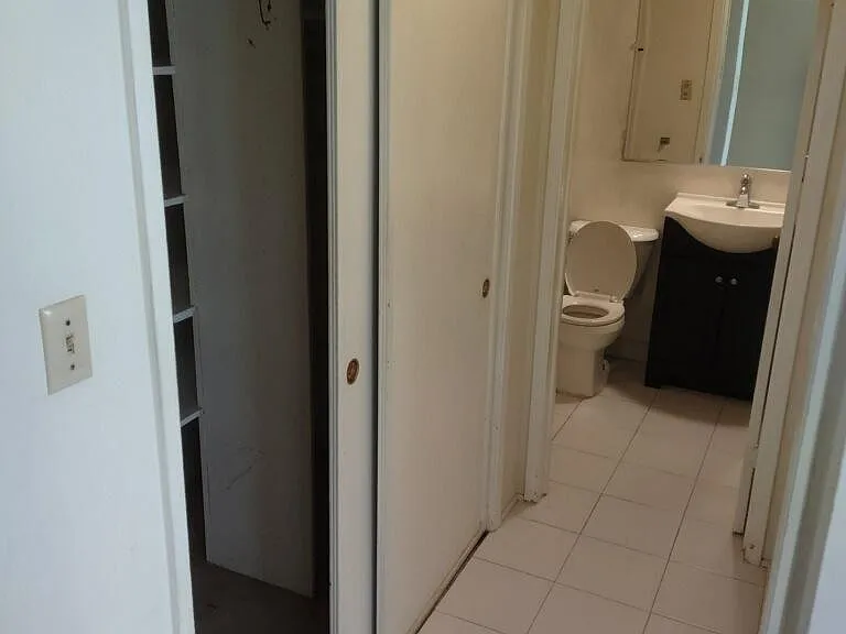 hallway closet and bathroom