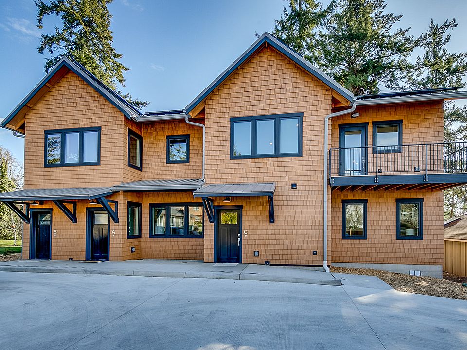Front of Ericksen apartments, the entrance door to apartment B is the on the left side of this photo.