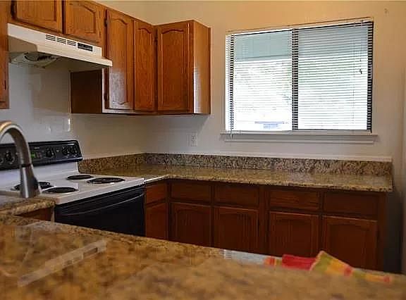 Kitchen with new granite countertops