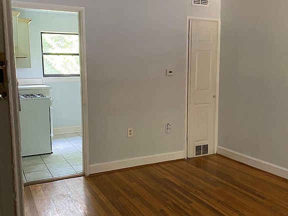 Standing from the front door. Ceiling fan. Kitchen is to the left. Bedroom and bathroom are straight through.