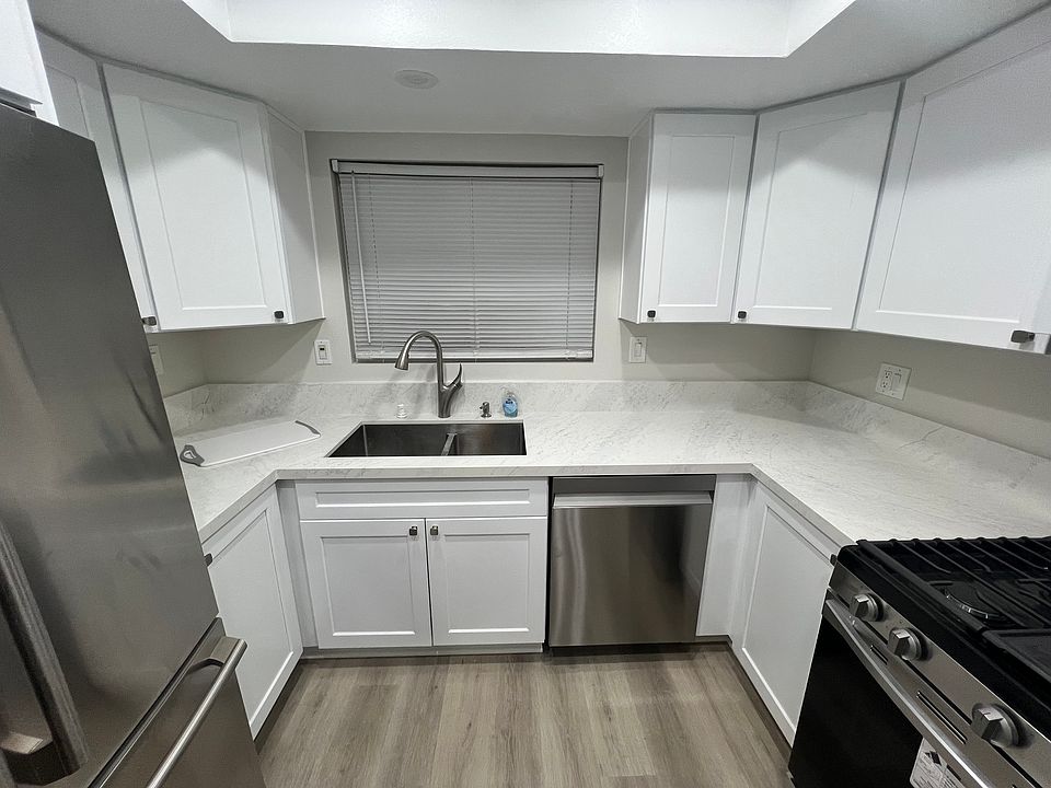 All new cabinets installed March 2024. New stove and dishwasher installed March 2024. Includes refrigerator and microwave.