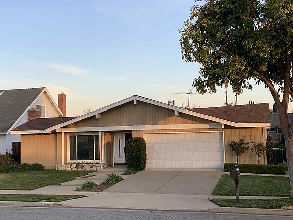 House Front View & Garage.