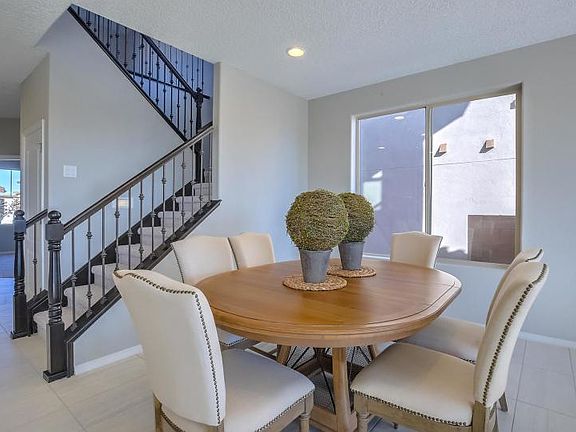 The cafe area is located next to the staircase and is perfect for family home cooked meals.