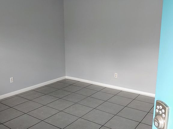 Walking in front door to living room
