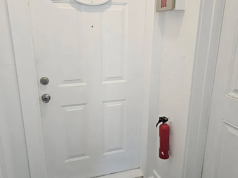 Enclosed foyer, apartment entry.