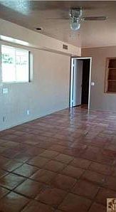 Large master bedroom with sliding door to the back yard