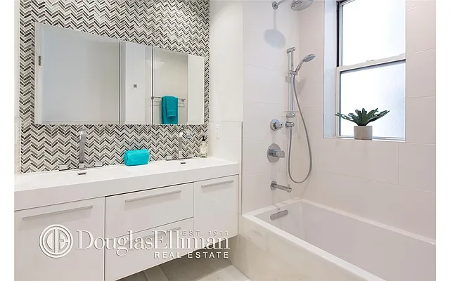 Sold by Douglas Elliman | media 13