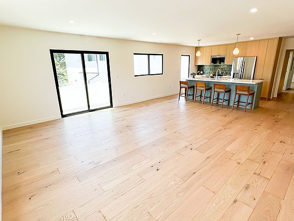Living Room with sliding glass door onto balcony