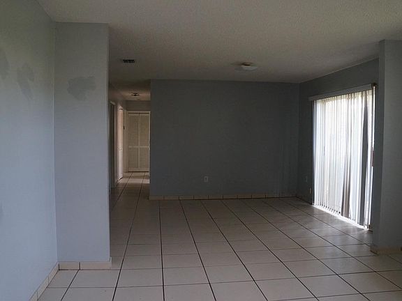 Livingroom, den and hall to bedrooms