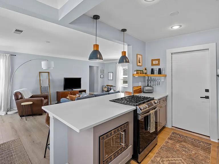 Modern kitchen with full-size appliances.