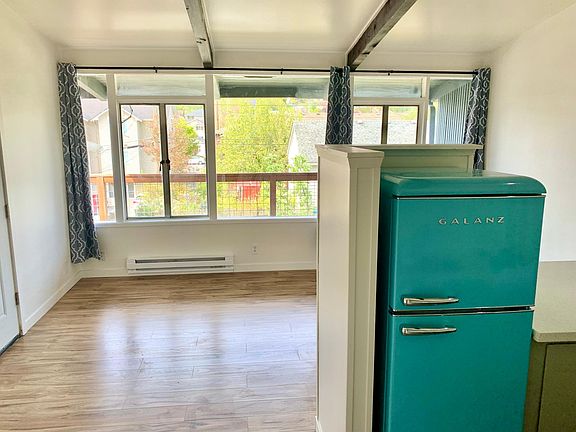 Wall of windows in main area provide and abundance of light