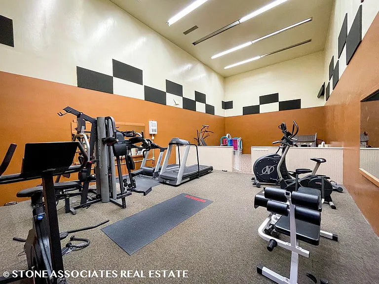 On-site fitness center with weights and equipment _ no gym membership needed.
