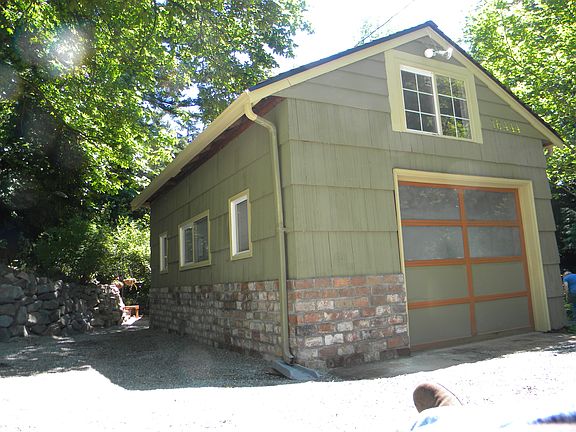 Distinguished Brick Band around detached garage.