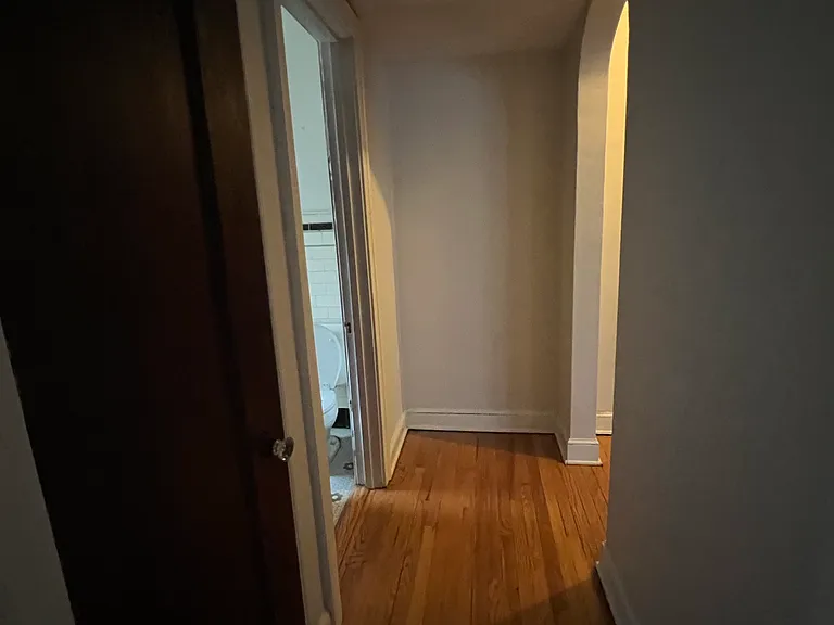 Hallway with linen closet