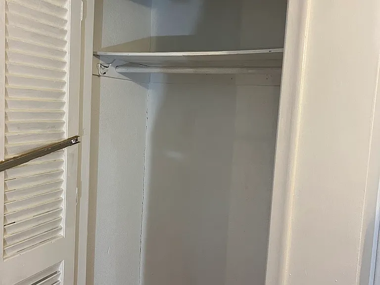Freshly painted entry coat closet