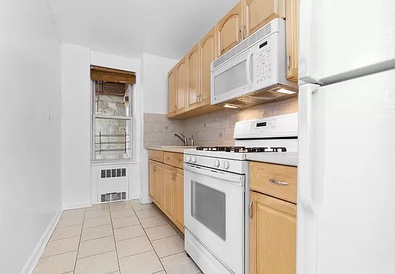4th image of 105-24 67th Ave #1G