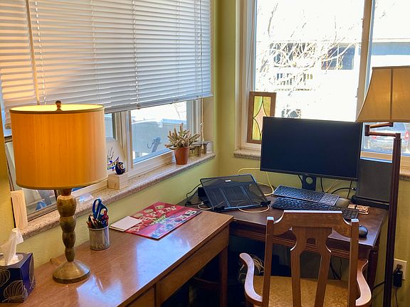 This sunny corner of the main living area makes an ideal home office.