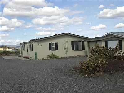 Beautiful Desert Landscaping, low - Maint. Golf Cart Shed, and plenty of room for large 2 car garage