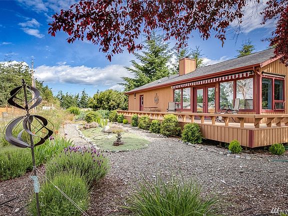 The sun-drenched deck spans the entire back of the home.