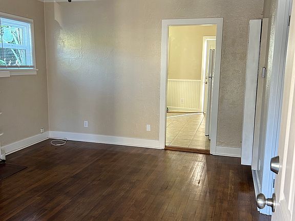 Front room looking into Kitchen area.