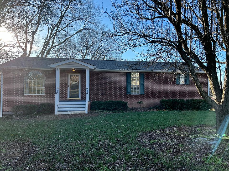 Front porch with large front yard