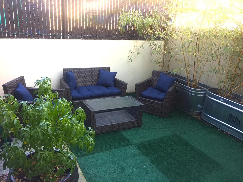 Patio furniture and planters included with rental at no cost