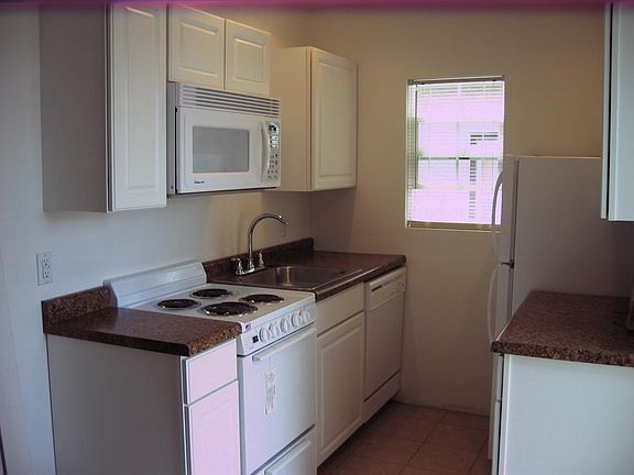 New White Kitchen, dishwasher, over the range Microwave. Electric Range, Refrigerator and Ceramic TileFloor