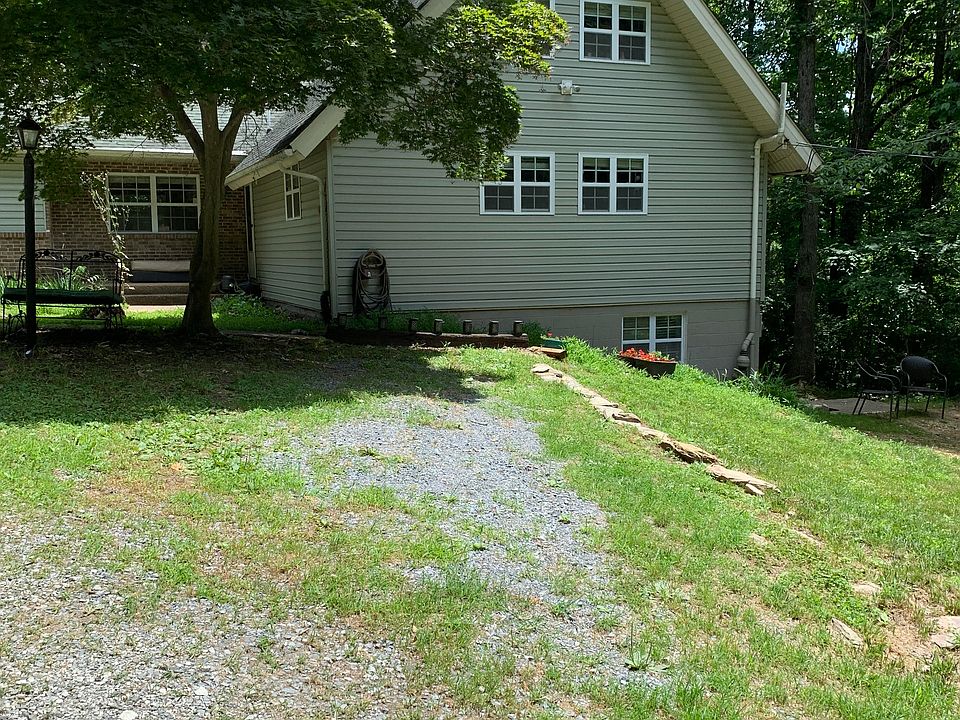 The apartment is down the steps to the right of the house.