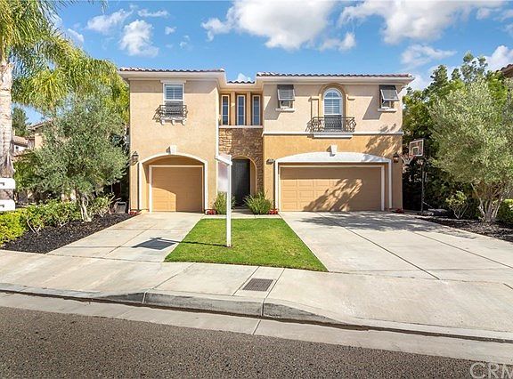 3 car garage and two driveways for multiple cars