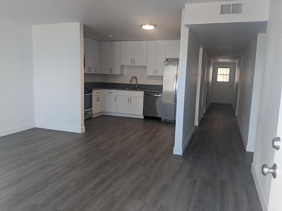 LIVING ROOM viewn into KITCHEN and HALLWAY