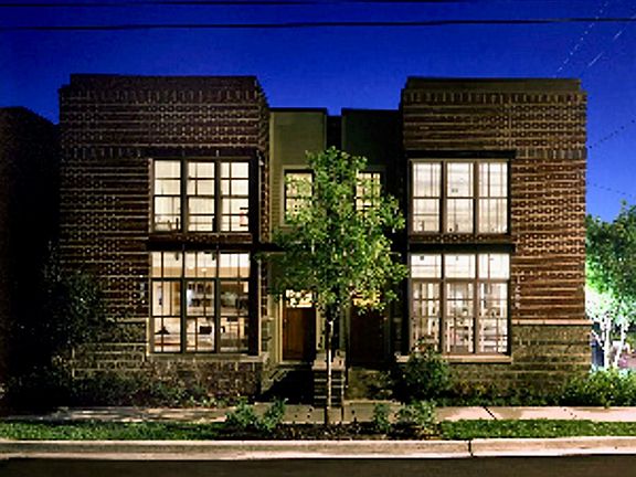 This urban row house fronts 9th Avenue North with sidewalk and street parking for guests and deliveries, plus two gated private parking spaces, a spacious deck, and common grounds on the back side of the home.