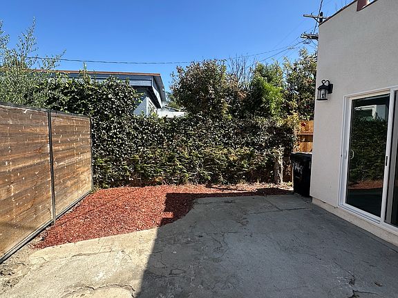 Spacious yard with practical indoor/outdoor flow