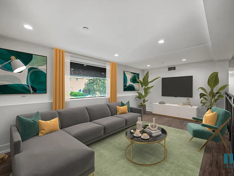 Living Room with Vinyl Flooring and Recessed Lighting - Two-Bedroom Two-Bathroom - Unit 108