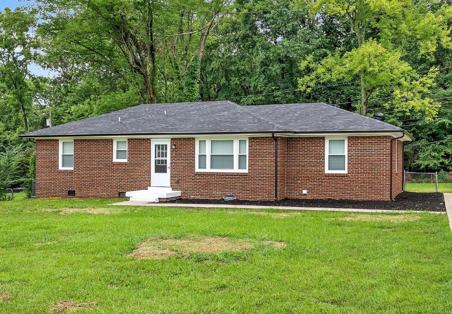 4 bed, 1.5 bath, 1450 sqft, $1,695 — Photo 1